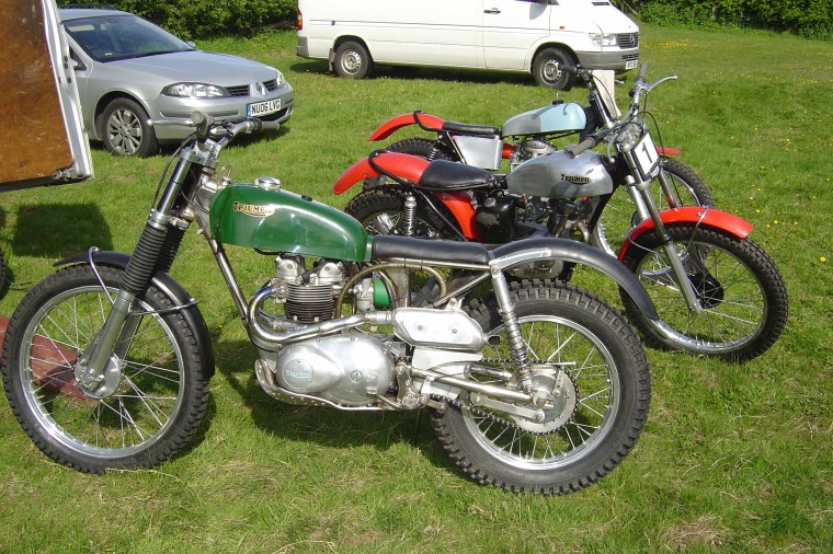 A Triumph 400cc twin, a nice Cub and a C15 which was for sale, approx $5,200