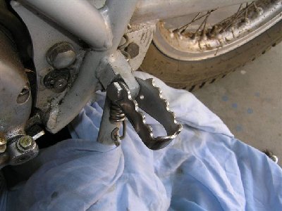 As sold in 1975 except for the hole I made for the spring end