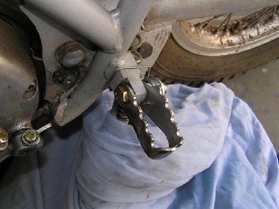 Return spring added to meet regulations for 2008