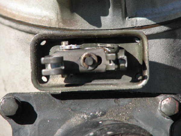 When on the bike the cable runs from the right to the hook on the left which depresses the central plunger