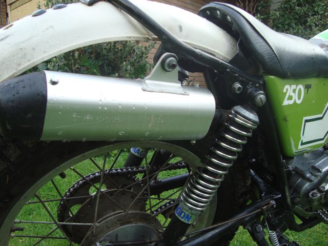 KX100 muffler